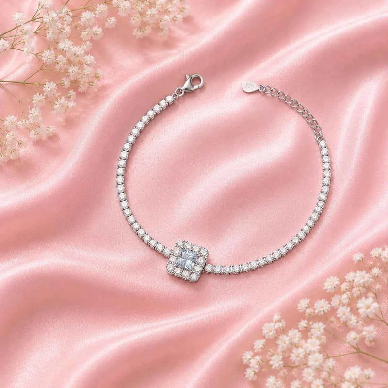925 silver bracelet with pavé row links and a square sky-blue stone charm at center