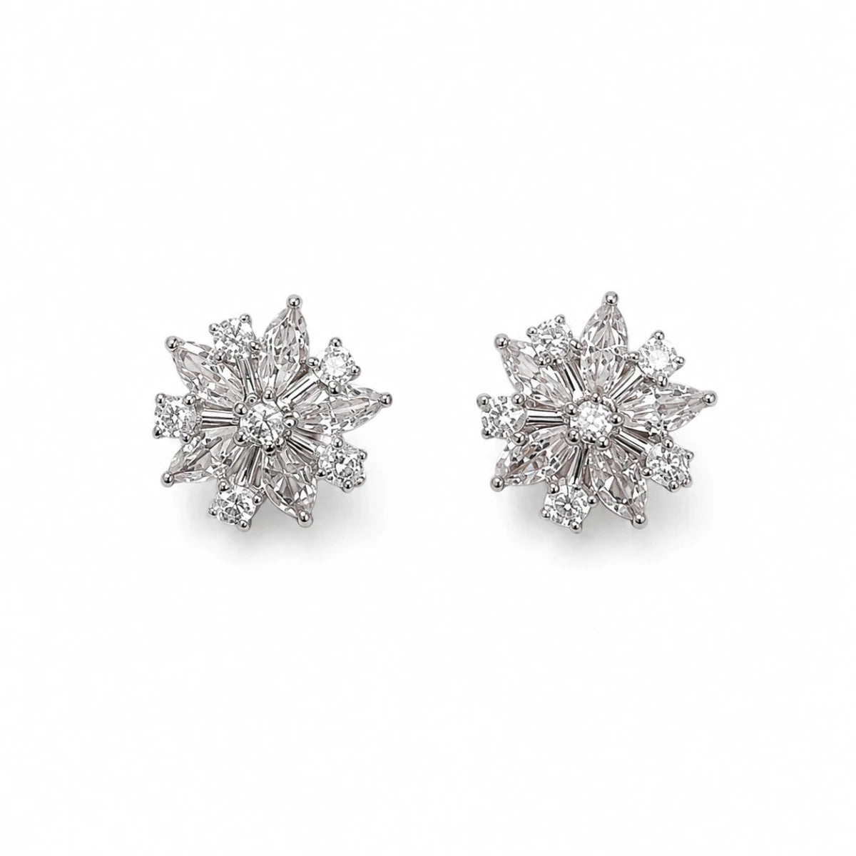 Snowflake Bloom zirconia stud earrings in 925 silver, prong-set starburst flower stones
