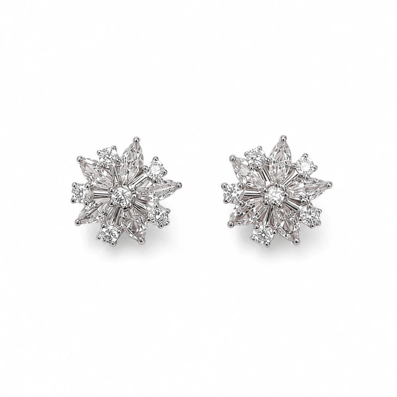 Snowflake Bloom zirconia stud earrings in 925 silver, prong-set starburst flower stones