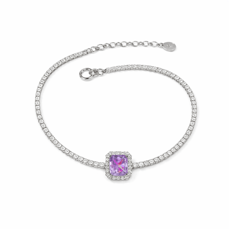 Silver tennis bracelet featuring a purple square halo gemstone on pavé link band