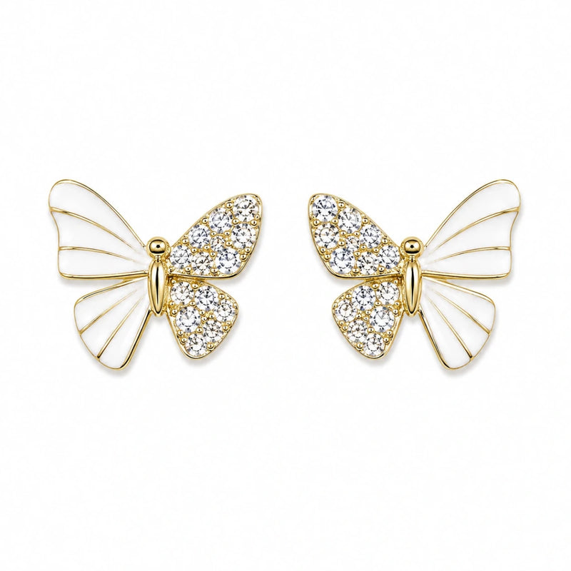 Butterfly stud earrings featuring white enamel wings and glittery crystal clusters