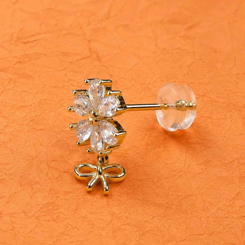 Zirconia floral stud earring with bow dangle and clear stones, gold-tone post