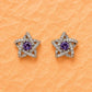 Star stud earrings with purple zirconia center and silver pave border