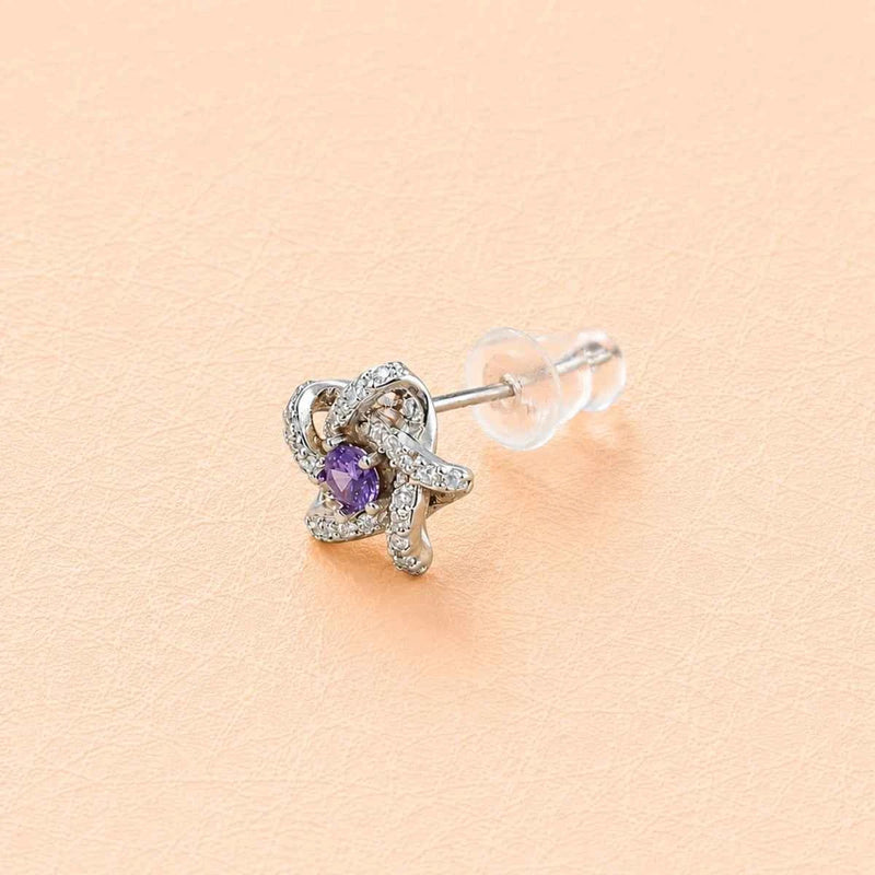 Star stud earrings with purple zirconia in 925 silver, butterfly backs